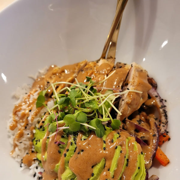 Chicken bowl with avocado and microgreens at Golden Juicery Tequesta